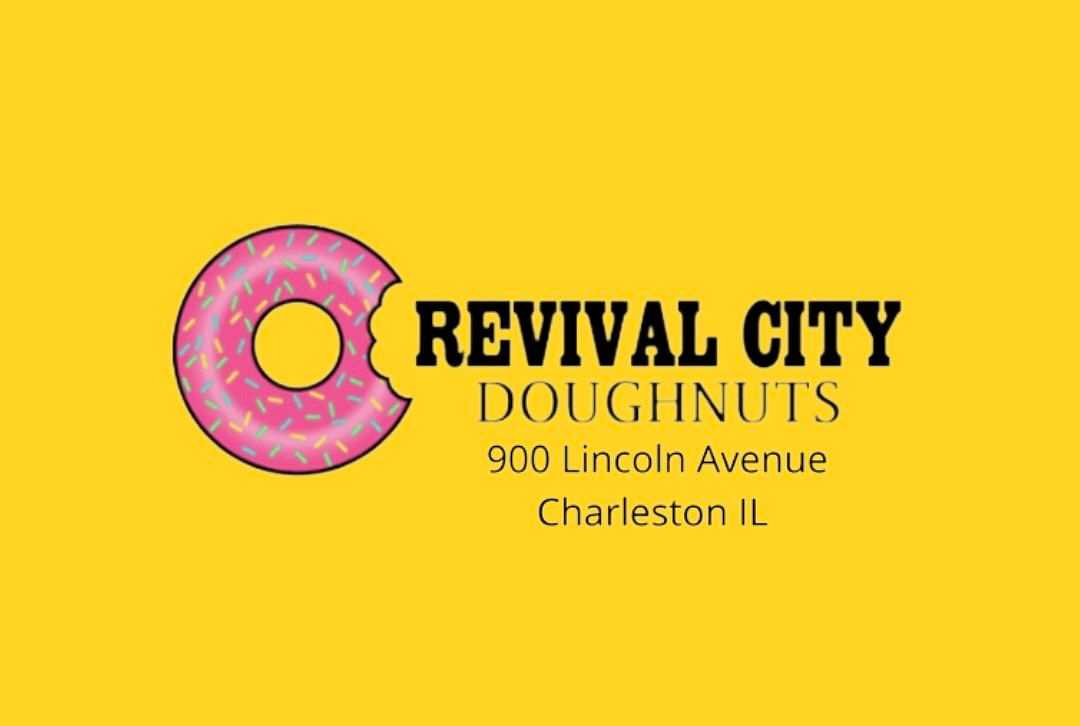 Revival City Doughnuts logo with address, 900 Lincoln Avenue, Charleston IL, on a yellow background.
